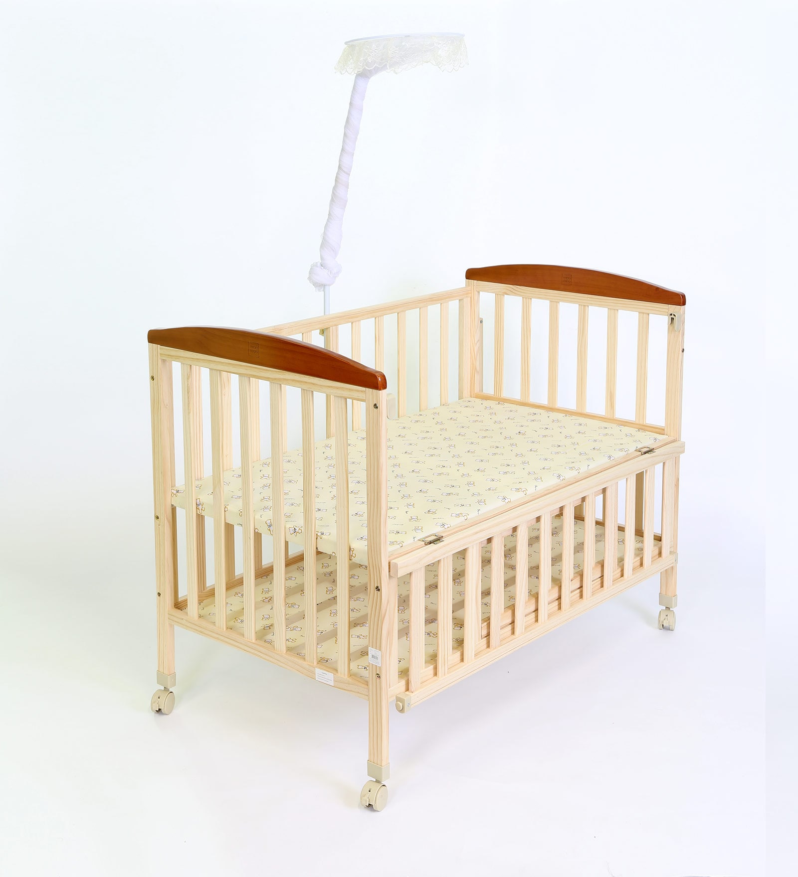 wooden cot with mosquito net