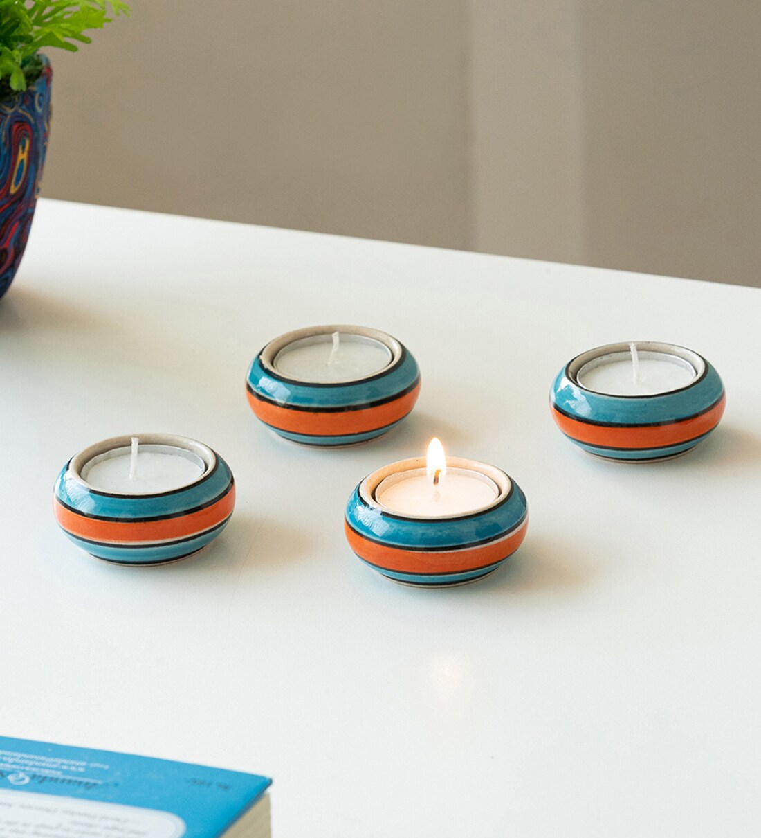 Buy Mughal Glow Blue & Orange Ceramic Tea Light Holder by ExclusiveLane