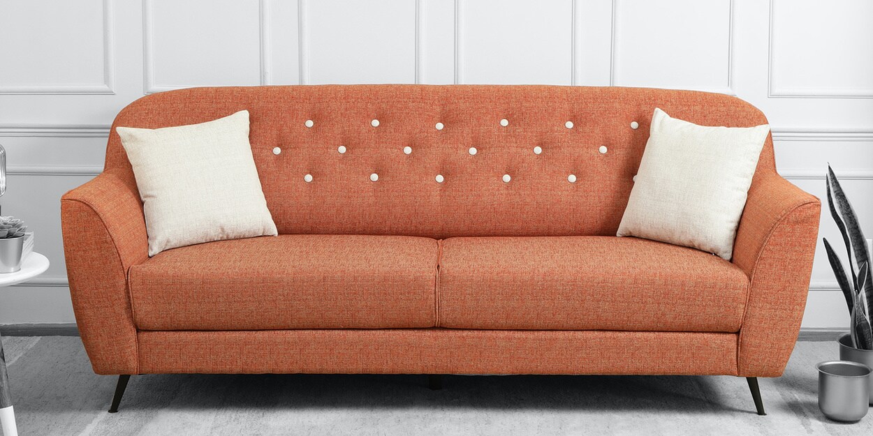 rust colour sofa